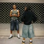 American retro personalized street pattern printed denim shorts for men and women loose fitting washed distressed shorts